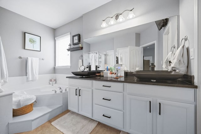 15413 Echo Hills Dr, Austin, TX 78717 - bathroom with double vanity, a bath, and a shower