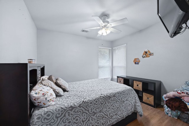 15413 Echo Hills Dr, Austin, TX 78717 - bedroom featuring wood finished floors and a ceiling fan