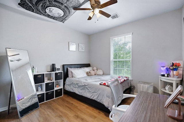 15413 Echo Hills Dr, Austin, TX 78717 - bedroom featuring wood finished floors and a ceiling fan