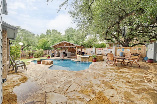 15413 Echo Hills Dr, Austin, TX 78717 - view of swimming pool with a gazebo, a fenced backyard, a patio, and a pool with connected hot tub