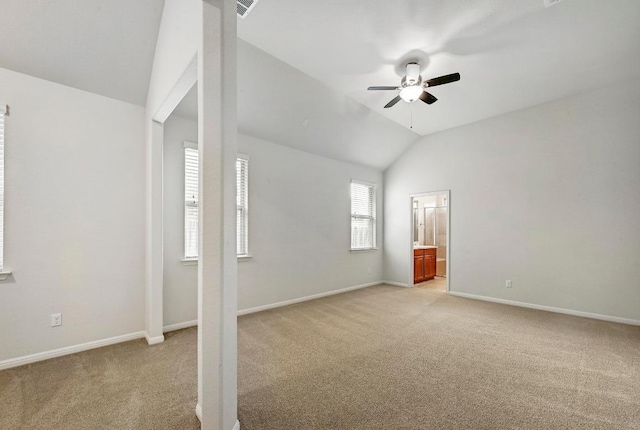 2344 Broken Wagon Dr, Leander, TX 78641 - unfurnished bedroom with lofted ceiling, light carpet, ensuite bath, and a ceiling fan