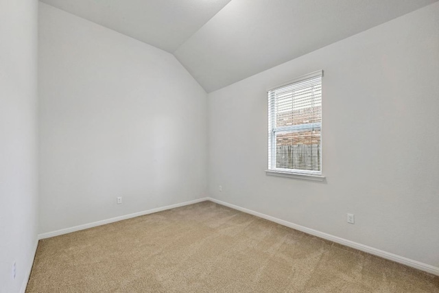 2344 Broken Wagon Dr, Leander, TX 78641 - spare room featuring light carpet and lofted ceiling