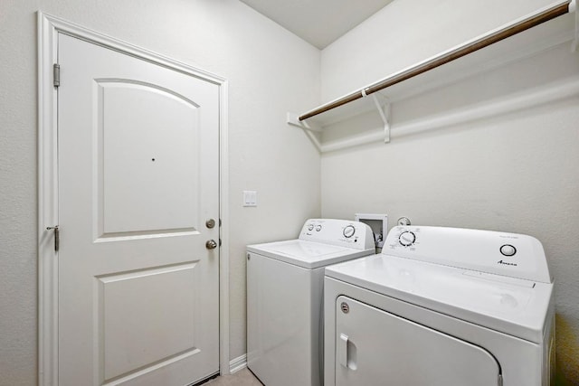 2344 Broken Wagon Dr, Leander, TX 78641 - washroom with washing machine and clothes dryer