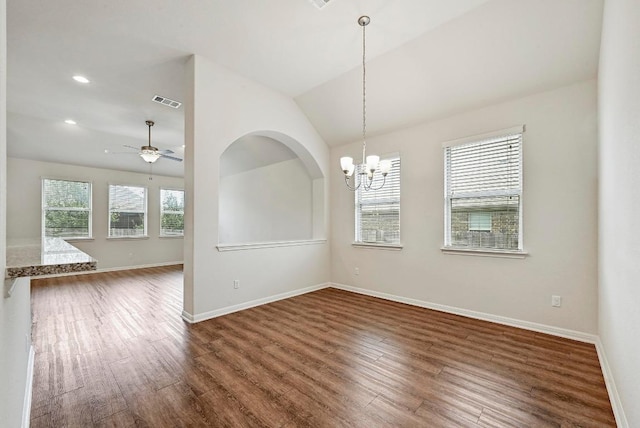 2344 Broken Wagon Dr, Leander, TX 78641 - unfurnished dining area featuring a chandelier, dark wood-style floors, a ceiling fan, recessed lighting, and lofted ceiling