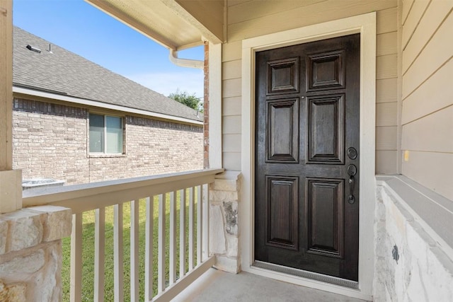 19105 Obed River Dr, Pflugerville, TX 78660 - property entrance featuring roof with shingles and a balcony