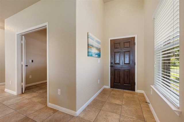 19105 Obed River Dr, Pflugerville, TX 78660 - entryway with light tile patterned flooring and baseboards