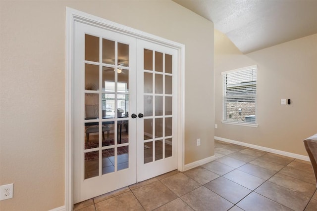 19105 Obed River Dr, Pflugerville, TX 78660 - doorway to outside featuring french doors, tile patterned flooring, and lofted ceiling
