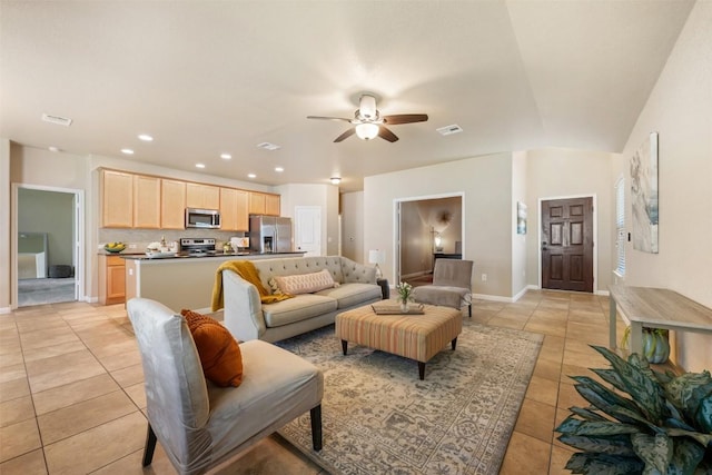 19105 Obed River Dr, Pflugerville, TX 78660 - living area with light tile patterned flooring, ceiling fan, and recessed lighting