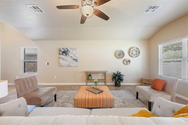 19105 Obed River Dr, Pflugerville, TX 78660 - living area featuring lofted ceiling, light tile patterned floors, and ceiling fan
