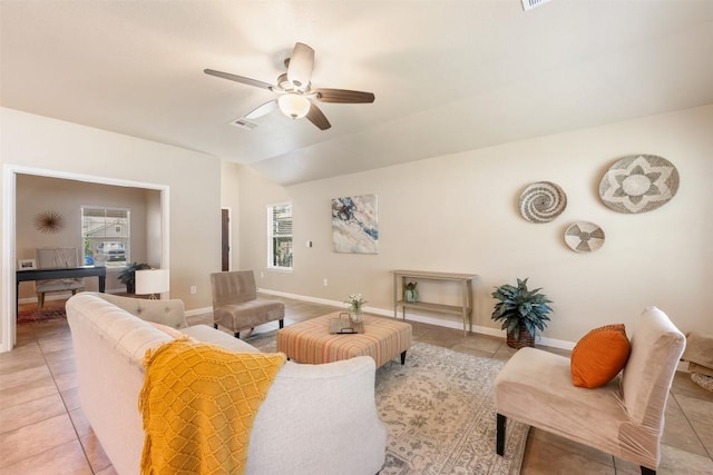 19105 Obed River Dr, Pflugerville, TX 78660 - living room featuring light tile patterned flooring, a ceiling fan, healthy amount of natural light, and lofted ceiling