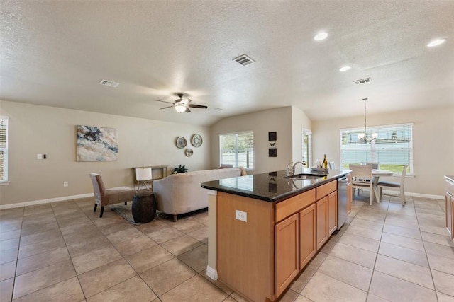 19105 Obed River Dr, Pflugerville, TX 78660 - kitchen with dishwasher, a textured ceiling, ceiling fan, recessed lighting, and a center island with sink