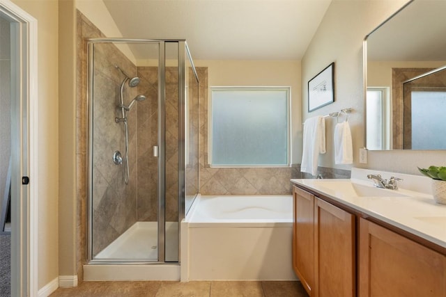 19105 Obed River Dr, Pflugerville, TX 78660 - bathroom featuring a garden tub, a stall shower, double vanity, and tile patterned flooring