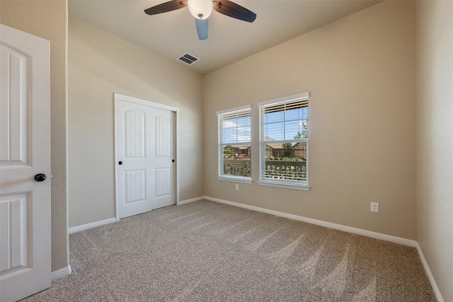 19105 Obed River Dr, Pflugerville, TX 78660 - unfurnished bedroom featuring carpet, a closet, and ceiling fan
