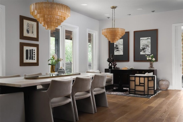 114 Medalist St, Lakeway, TX 78734 - dining area with wood finished floors and recessed lighting