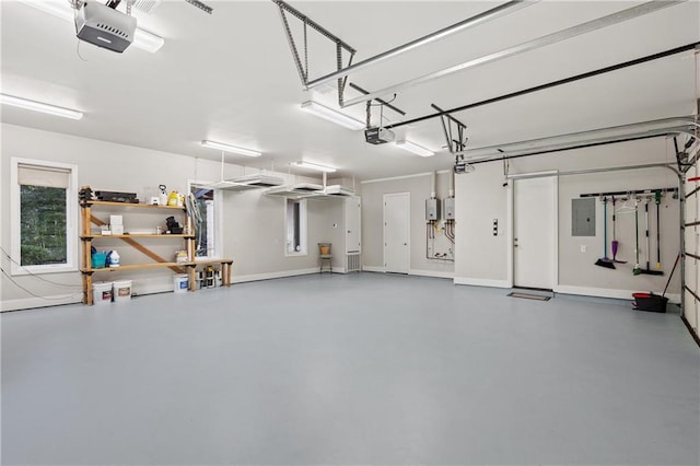 114 Medalist St, Lakeway, TX 78734 - garage featuring a garage door opener and electric panel