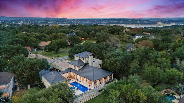 114 Medalist St, Lakeway, TX 78734 - aerial view at dusk of view of pool