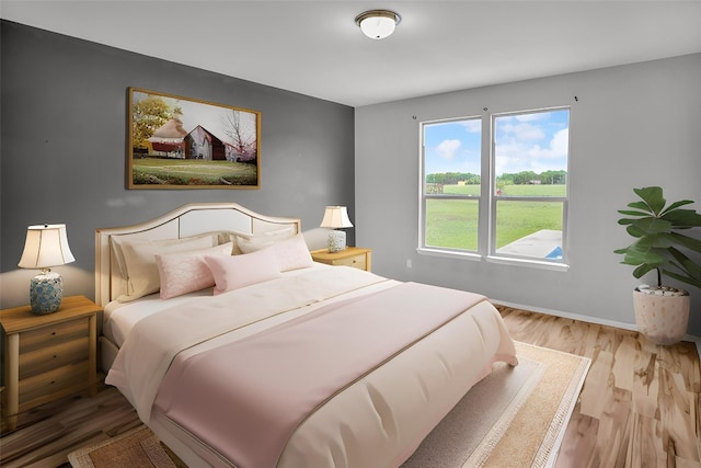 123 Brittany Ln, Bastrop, TX 78602 - bedroom featuring wood finished floors and baseboards