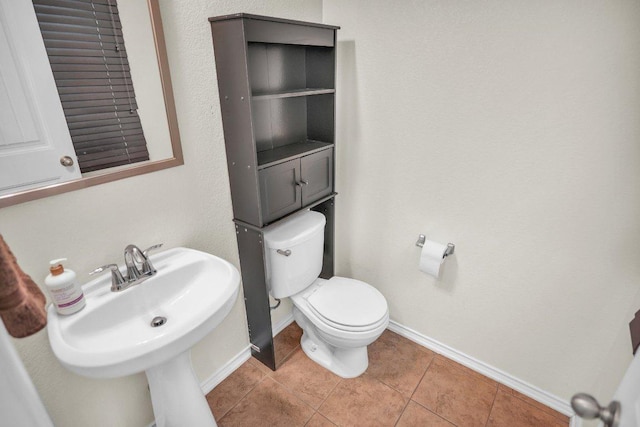 123 Brittany Ln, Bastrop, TX 78602 - half bathroom featuring baseboards and tile patterned floors