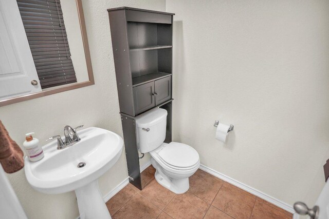 123 Brittany Ln, Bastrop, TX 78602 - bathroom with baseboards and tile patterned flooring