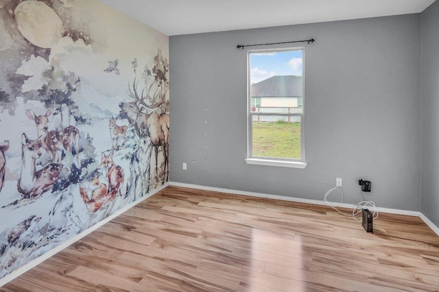 123 Brittany Ln, Bastrop, TX 78602 - unfurnished room featuring plenty of natural light and wood finished floors