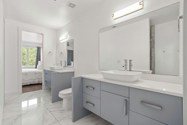 14430 Tuscola Cir, Austin, TX 78734 - full bath with vanity, marble finish flooring, and ensuite bath