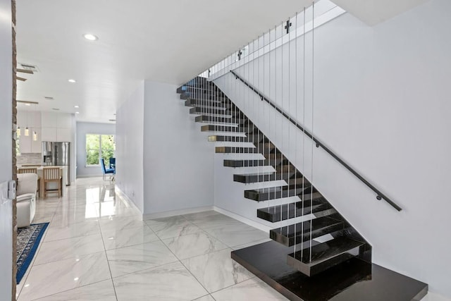 14430 Tuscola Cir, Austin, TX 78734 - staircase featuring recessed lighting and marble finish flooring
