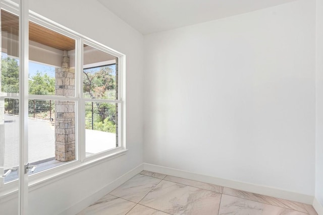14430 Tuscola Cir, Austin, TX 78734 - unfurnished room with light marble finish flooring and plenty of natural light