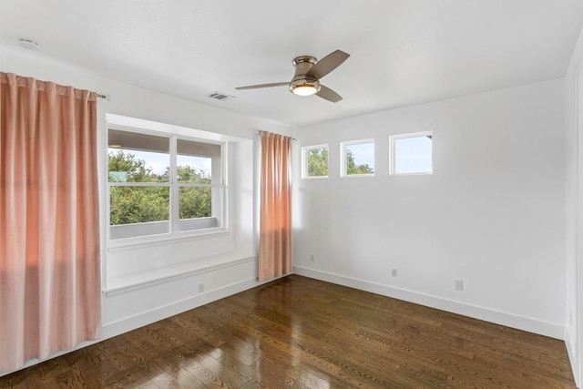 14430 Tuscola Cir, Austin, TX 78734 - unfurnished room with healthy amount of natural light, ceiling fan, dark wood-style floors, and a smoke detector