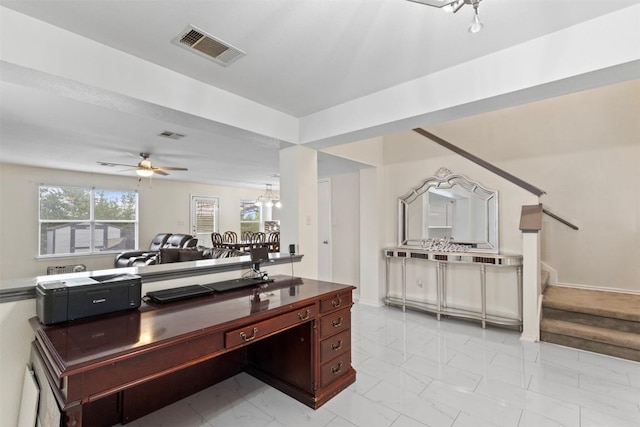 161 Prairie Verbena Dr, Kyle, TX 78640 - kitchen with light marble finish floors, a ceiling fan, open floor plan, and a chandelier