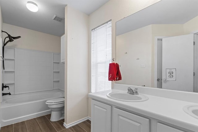 161 Prairie Verbena Dr, Kyle, TX 78640 - full bath with wood finished floors, double vanity, plenty of natural light, and shower / tub combination
