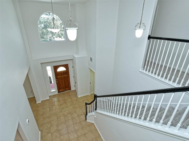 106 S Gadwall Ln, Cedar Park, TX 78613 - entrance foyer with a high ceiling, plenty of natural light, and stairs