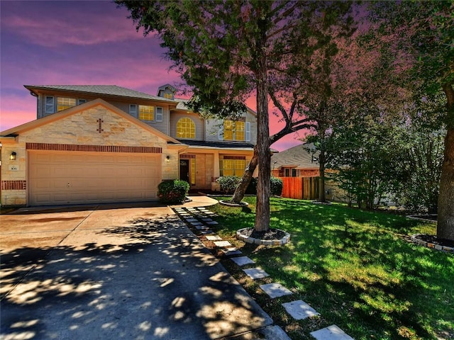 106 S Gadwall Ln, Cedar Park, TX 78613 - view of front facade featuring stone siding, a garage, and concrete driveway