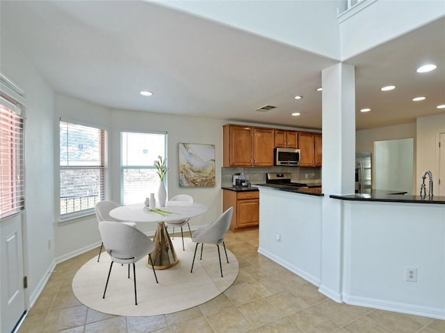106 S Gadwall Ln, Cedar Park, TX 78613 - dining room featuring recessed lighting and light tile patterned floors