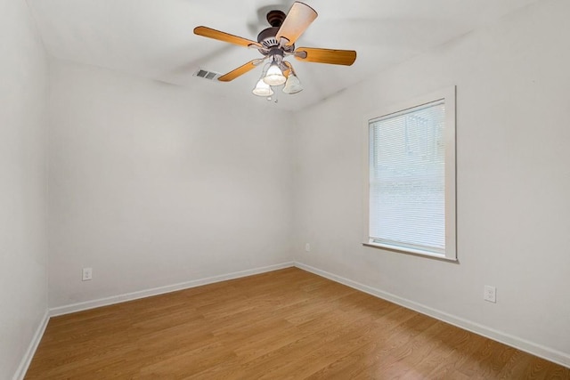 2834 Pearl St, Austin, TX 78705 - empty room with light wood-style floors and ceiling fan