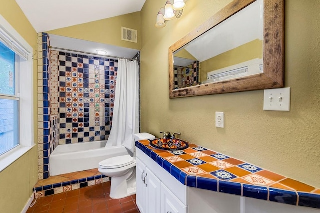 2834 Pearl St, Austin, TX 78705 - bathroom featuring tile patterned flooring, shower / tub combo with curtain, vanity, vaulted ceiling, and a textured wall
