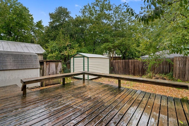 2834 Pearl St, Austin, TX 78705 - wooden deck with a storage unit and a fenced backyard