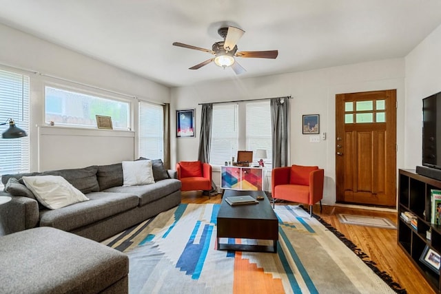 2834 Pearl St, Austin, TX 78705 - living area with light wood-type flooring and a ceiling fan
