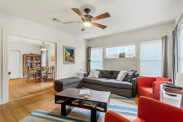 2834 Pearl St, Austin, TX 78705 - living room with wood finished floors and a ceiling fan