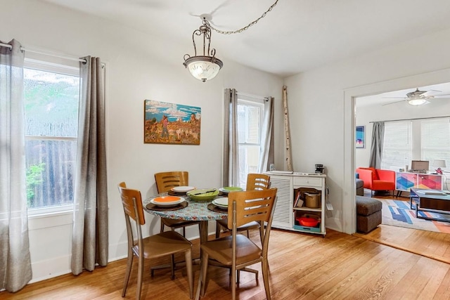 2834 Pearl St, Austin, TX 78705 - dining area with light wood finished floors, plenty of natural light, and ceiling fan