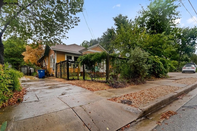 2834 Pearl St, Austin, TX 78705 - view of property hidden behind natural elements featuring driveway