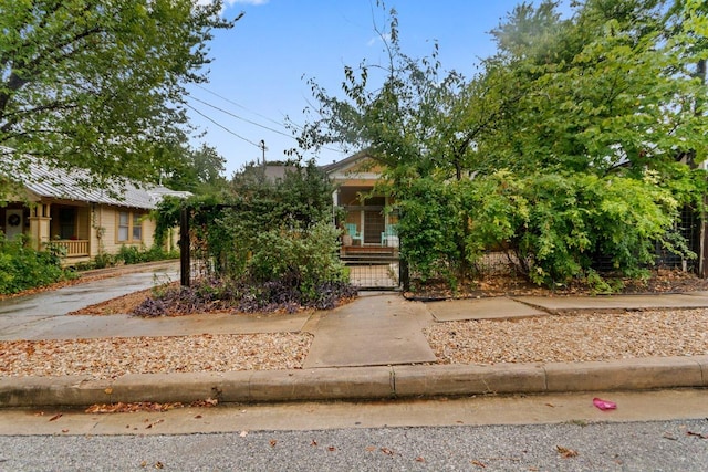 2834 Pearl St, Austin, TX 78705 - obstructed view of property with a porch