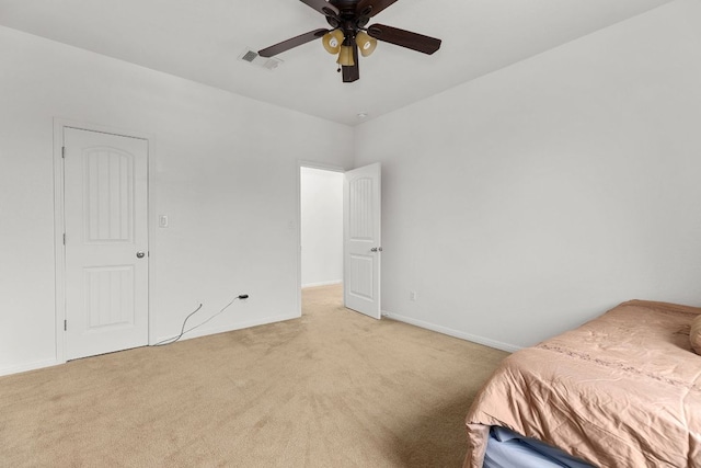 204 Lake Livingston Dr, Georgetown, TX 78628 - bedroom with light carpet and a ceiling fan