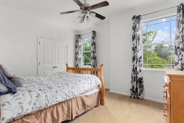 204 Lake Livingston Dr, Georgetown, TX 78628 - bedroom with a closet, light colored carpet, and ceiling fan