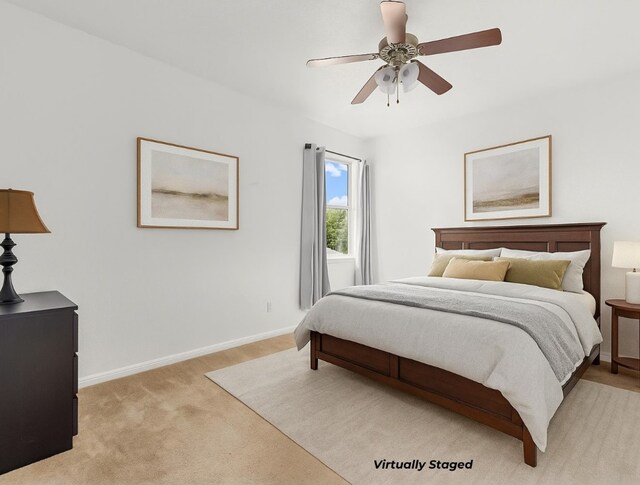 204 Lake Livingston Dr, Georgetown, TX 78628 - bedroom with light colored carpet and ceiling fan