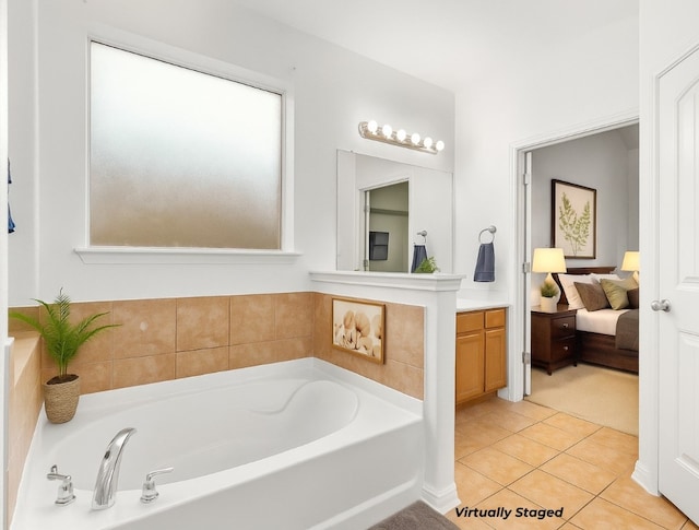 204 Lake Livingston Dr, Georgetown, TX 78628 - full bathroom featuring a bath, vanity, tile patterned flooring, and connected bathroom