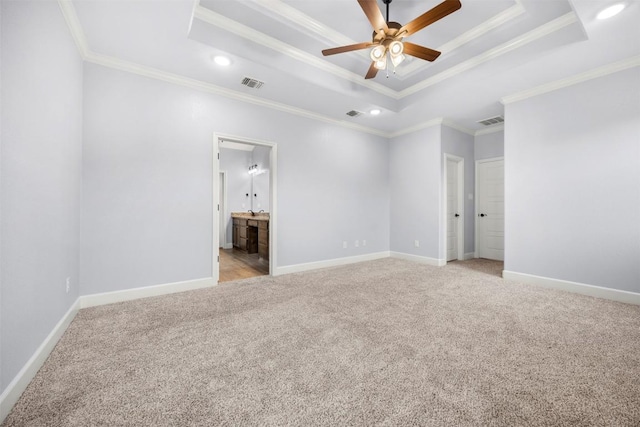 2660 Cowgirl Trl, Belton, TX 76513 - unfurnished bedroom with a raised ceiling, ornamental molding, light colored carpet, recessed lighting, and connected bathroom