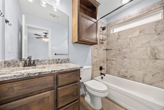 2660 Cowgirl Trl, Belton, TX 76513 - bathroom with vanity, bathtub / shower combination, wood finished floors, and ceiling fan