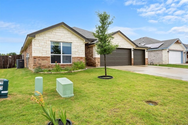 2660 Cowgirl Trl, Belton, TX 76513 - view of front of property with an attached garage, driveway, brick siding, and stone siding