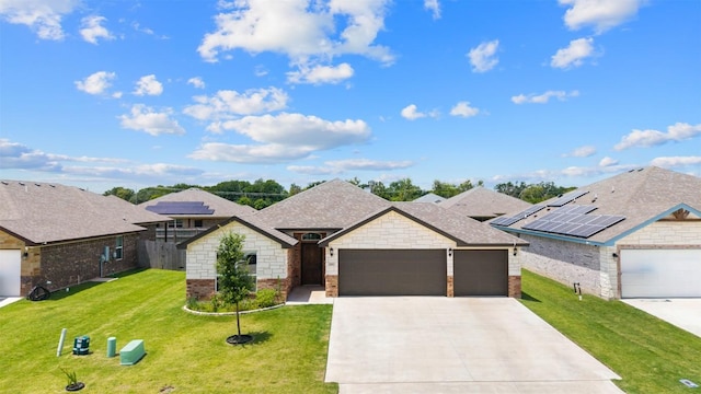2660 Cowgirl Trl, Belton, TX 76513 - french country inspired facade with a garage, driveway, brick siding, and a shingled roof