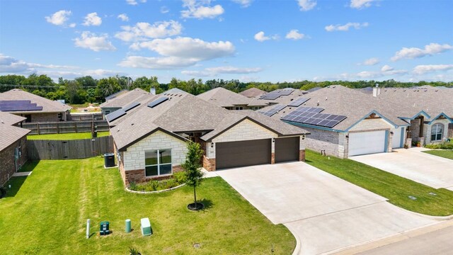 2660 Cowgirl Trl, Belton, TX 76513 - view of front of property with an attached garage, driveway, a shingled roof, a residential view, and stone siding